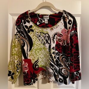 Preowned Chico’s colorful top. Size 2 (L)